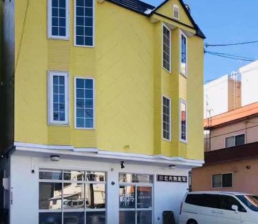 Shiroishi Apartment | Warm House3