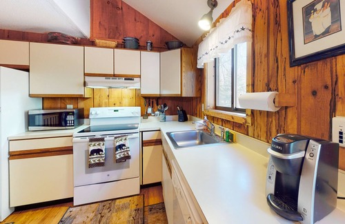 West Dover House | Warm & woodsy retreat with a fireplace, washer/dryer, heated pool & fitness room