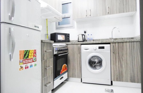 International City House | Warsan Star Residence - Home Stay