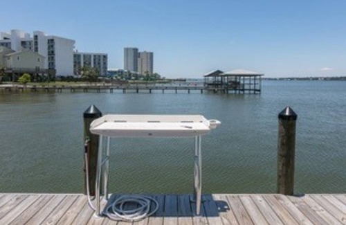 Gulf Shores Condo | WATER FRONT! Beach Access! Pool! Private dock