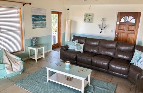 Breezeswept Beach Estates House | Water Front Home. Direct deep water access with private pool/spa/dock & Elevator