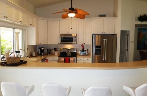 Yacht Club House | Water-park style pool with hot tub in grotto w. waterfall + bridge over pool