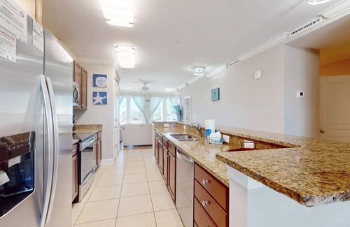 Mexico Beach Condo | Water-view condo with hot tub, pool, fitness room & balcony - dog-friendly