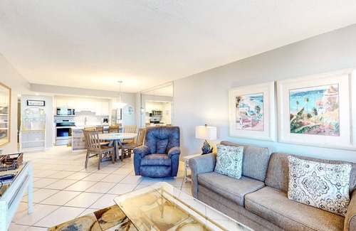 Holiday Isle Condo | Water-view condo with heated pool, hot tub, sports courts & on-site beach access