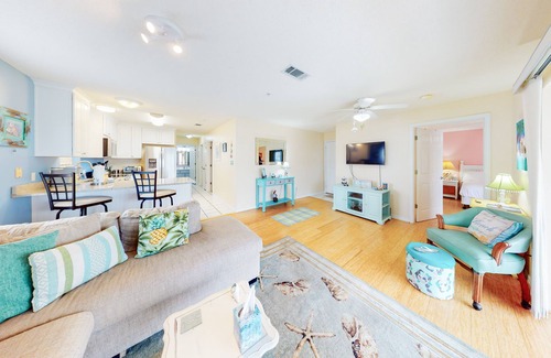 Navarre Beach Condo | Water-view haven with sound-view balcony, shared pool, WiFi, and AC