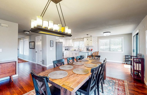 West End House | Water-view home with ADU, gated entry, hot tub, enclosed yard, deck, & 2 W/Ds