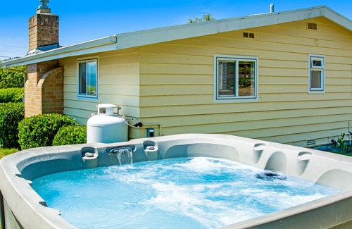 Freeland House | Water-view home with private hot tub & beach access