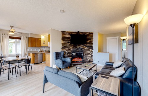 Bay City House | Water view retreat with scenic deck, grill, yard, fireplace, board games, & W/D