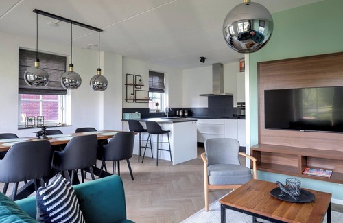 Municipality of Medemblik House | Water villa Wellness Deluxe 6 persons with sauna and Sunshower (inside) and jacuzzi and Kamado BBQ (in the garden)