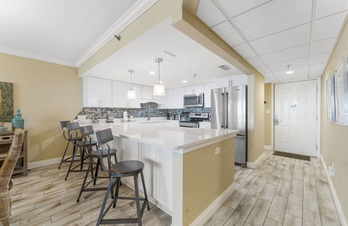 Biltmore Beach Condo | Watercrest 705 - Beach Chairs Included in this Updated Designer Condo!