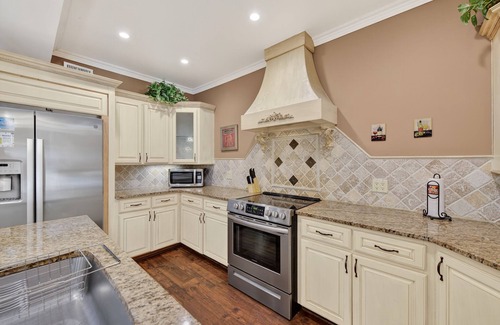 Daytona Beach House | Waterfall Grotto Pool | Sunset on the Riverfront | Dock | Bring the Boat