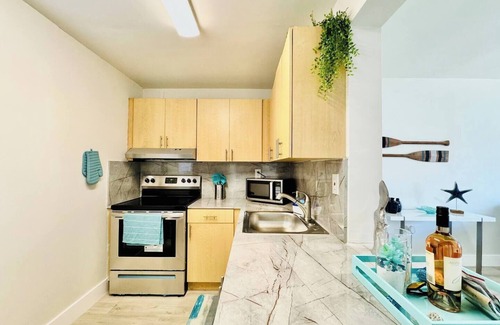 Eastern Shores Apartment | Waterfront 1BR, Parking , Walk to the Beach