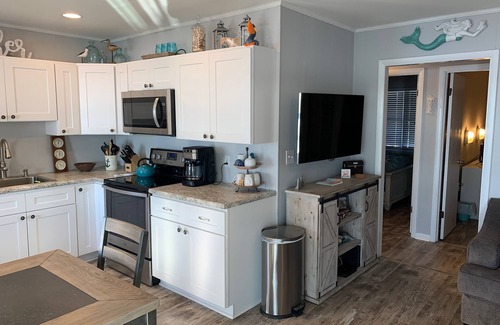 Chincoteague Condo | Waterfront, 2nd floor. Dedicated boat slip. Great view of ponies and lighthouse.