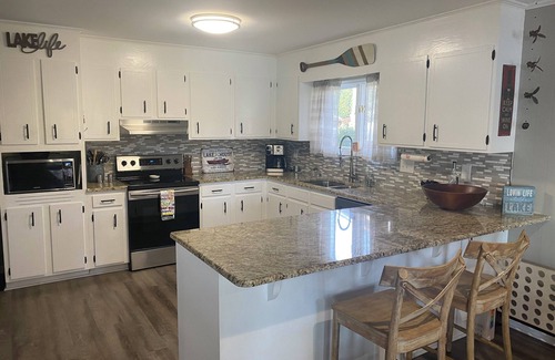 Troutman House | Waterfront /5 Bedrooms /3 BA's /2 FULL KITCHENS /Firepit /Boat Dock /Pier