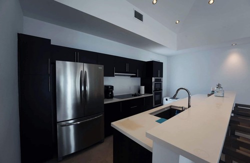 Alice Town House | Waterfront Bliss: Modern & Luxurious 4 Bedroom Home in Bimini, Bahamas