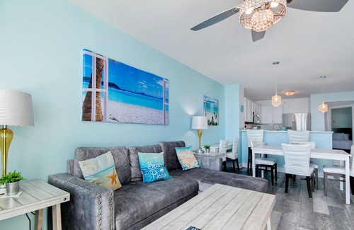 Cherry Grove Beach Condo | Waterfront condo with a balcony, heated pool, hot tub, W/D, gym, & beach access