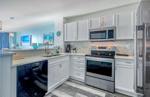 Cherry Grove Beach Condo | Waterfront condo with a balcony, heated pool, hot tub, W/D, gym, & beach access