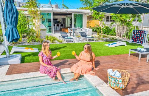 Coral Ridge Villa | Waterfront Compound 2 Heated Pools SaltAire Lime Keys