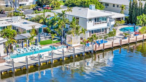 Coral Ridge Villa | Waterfront Compound 2 Heated Pools SaltAire Lime Keys