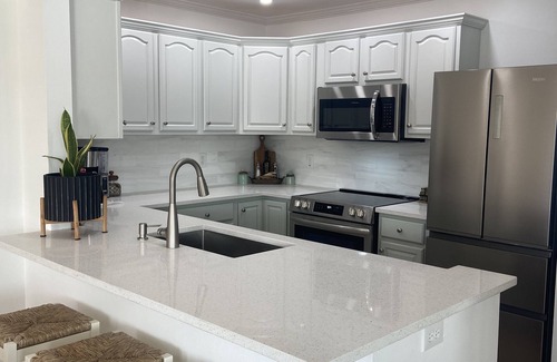 Apollo Beach Condo | Waterfront condo, gated, dock, lanai, newly remodeled, single story.