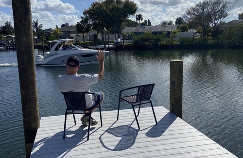 Apollo Beach Condo | Waterfront condo, gated, dock, lanai, newly remodeled, single story.