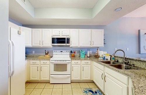 Orange Beach Condo | Waterfront condo w/shared pool, tennis, & sauna - near the beach