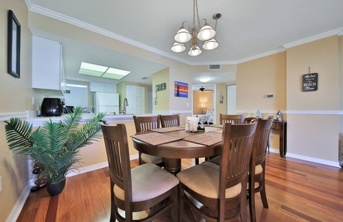 Butler Beach Condo | Waterfront condo with community pools & hot tub - walk to the beach