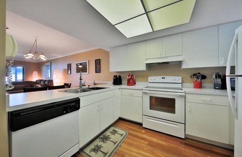 Butler Beach Condo | Waterfront condo with community pools & hot tub - walk to the beach