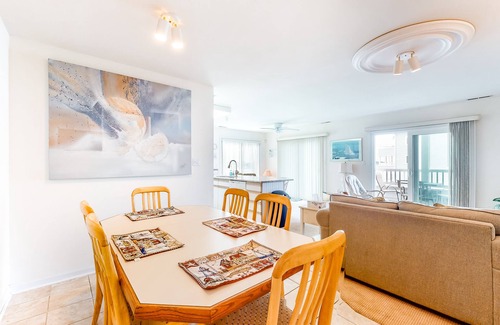 Ocean City Condo | Waterfront condo with pool, balcony, fireplace, central AC, & washer/dryer