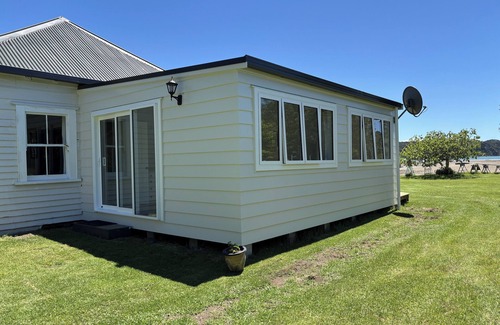 Russell House | Waterfront Historic Homestead in Clendon Cove with boat ramp