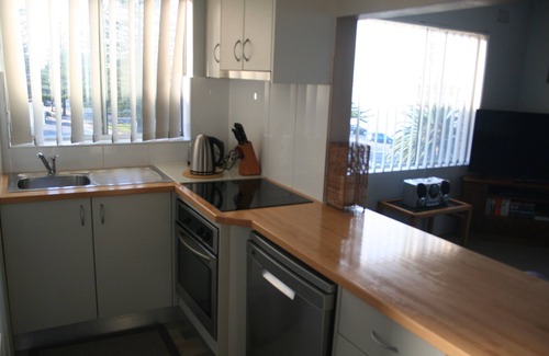 The Entrance Apartment | Waterfront Holiday Apartment, north facing, superb 180 deg views, sunny balcony