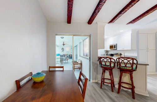 Lochmoor Waterway Estates House | Waterfront home with pool, bikes, grill, fireplace, internet, W/D, & central AC