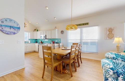 Ocean Isle Beach House | Waterfront home near the beach with outdoor gathering areas, pools & piers