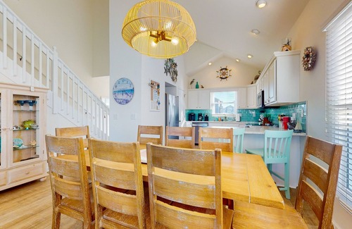 Ocean Isle Beach House | Waterfront home near the beach with outdoor gathering areas, pools & piers