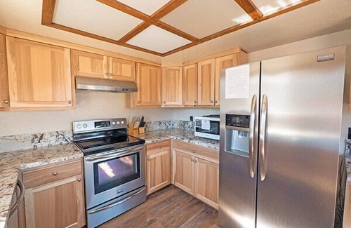 Tahoe Keys House | Waterfront Home with Mountain Inspired Decor, Private Hot Tub and Boat Dock.