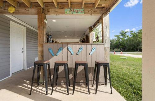 Shoreline Park House | Waterfront Home Game Room Ping Pong Outdoor Bar Area