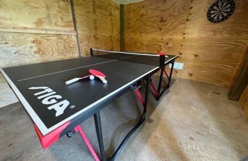 Shoreline Park House | Waterfront Home Game Room Ping Pong Outdoor Bar Area