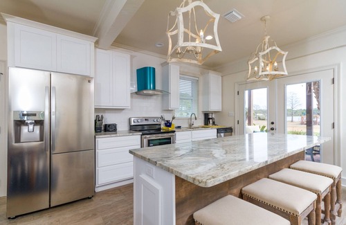 Ono Island House | Waterfront Home on Perdido Beach in Elberta with sandy beach, pier & boat house.