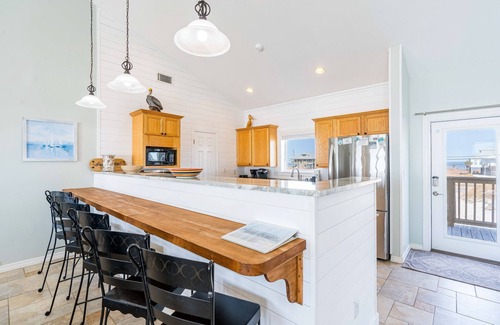 Dauphin Island House | Waterfront home with wraparound deck, BBQ, spacious interior, & W/D
