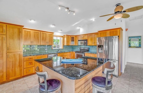 Eden Pines House | Waterfront Home with easy access to Pine Channel. Wi-Fi, 60ft seawall, Tiki Hut