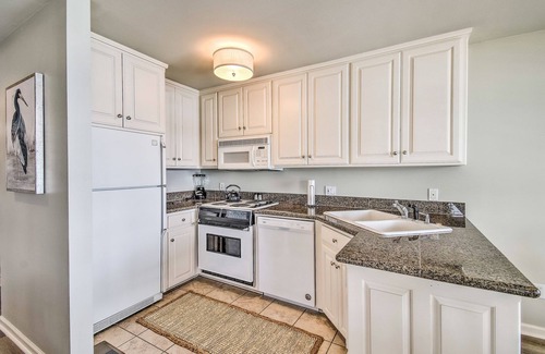 Mid America House | Waterfront home with a washer/dryer, firepit, central AC, & deck