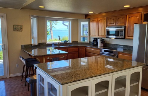 Camano Island House | Waterfront Home with Game Room, Fireplaces, Kayaks, AC and Private Beach Access
