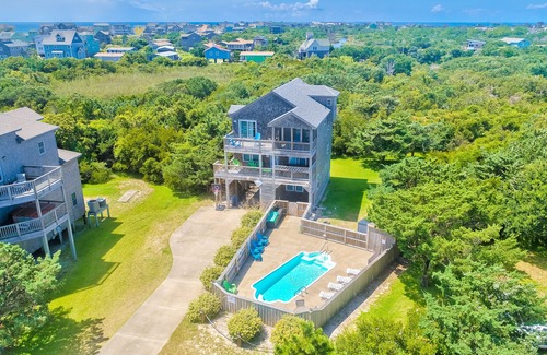 Hatteras House | Waterfront house near beach access with AC, private pool & hot tub -dog-friendly
