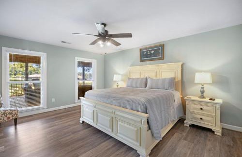 Chappells Villa | waterfront Lake Greenwood boat launch king beds hot tub fire pit sun sets pellet grill private peninsula