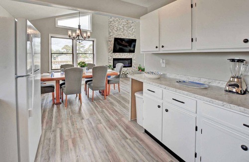 Colington Harbour House | WATERFRONT!. Lux spacious home. Private docks. Fishing, Crabbing, and Kayaking!