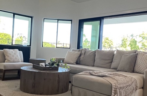 Val Vista Lakes House | Waterfront Luxury Home w/ Heated Pool and Spa