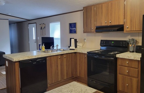 Littleton House | Waterfront mobile home on beautiful Lake Gaston with private pier access.