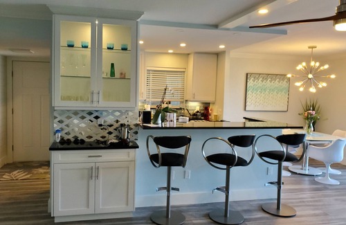 Moorings Condo | Waterfront- Newly Renovated walk out to Bay & Steps to Beach 2BR/2Ba
