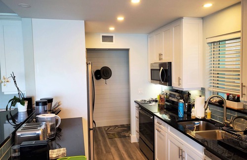Moorings Condo | Waterfront- Newly Renovated walk out to Bay & Steps to Beach 2BR/2Ba