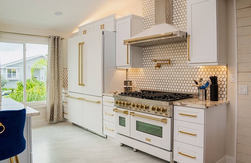 Indian Rocks Beach House | Waterfront Oasis, Heated Pool, Dock, Golf Cart & Chef’s Kitchen